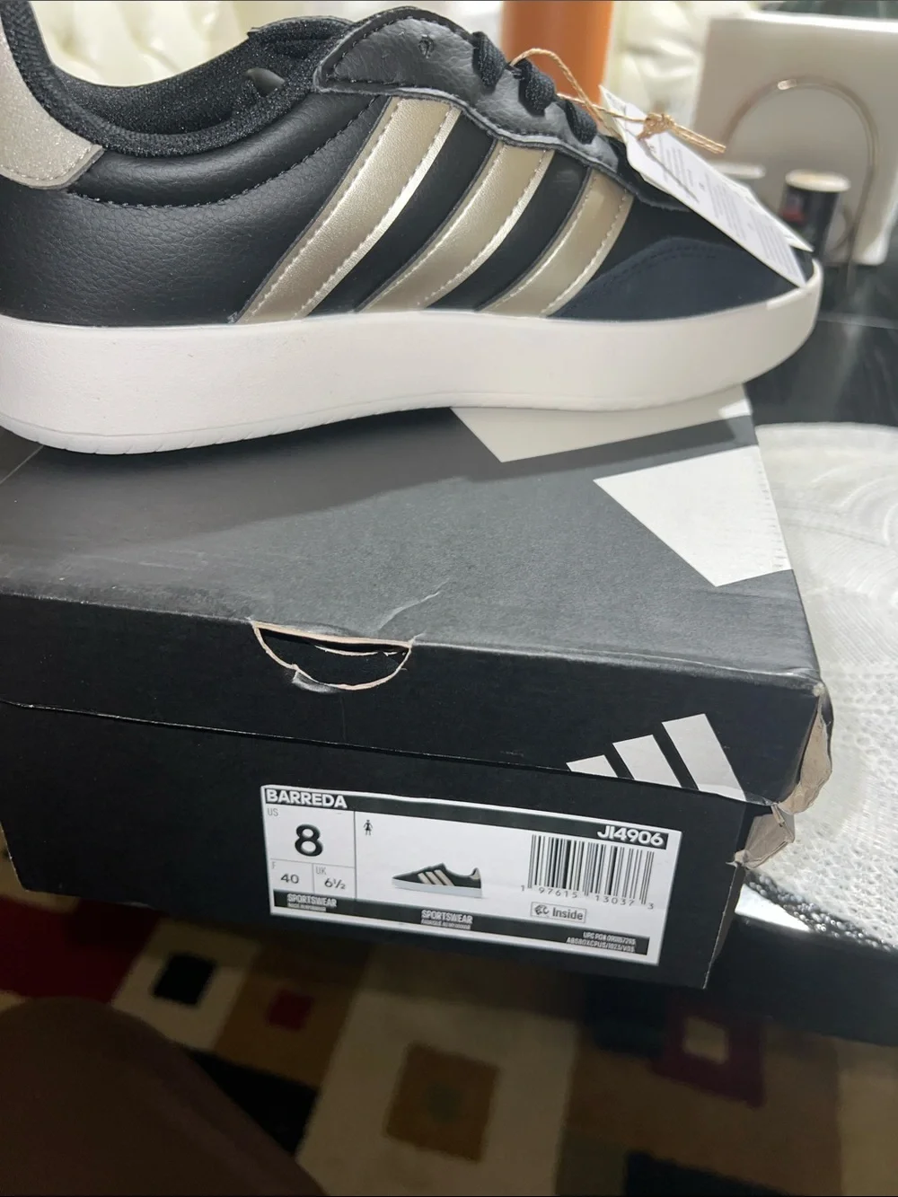 adidas Black Sneakers with Gold Stripes